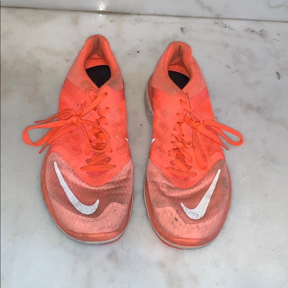 bright orange nike shoes